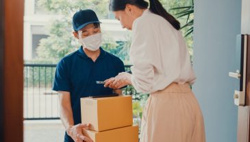 Young,Asian,Delivery,Man,Wear,Mask,In,Blue,Navy,Uniform