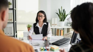 Insurance,Agent,Answering,Questions,Of,Couple